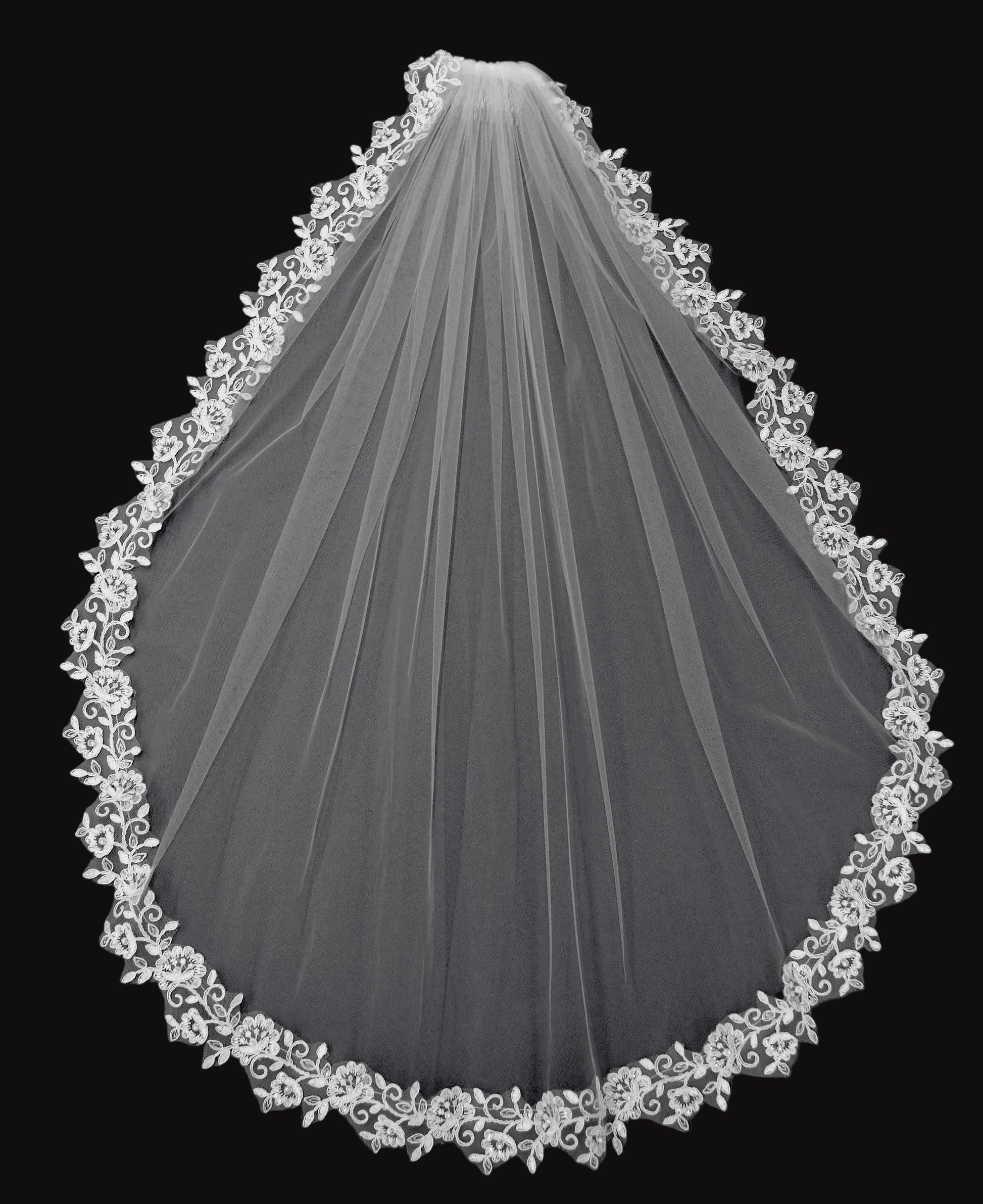 White wedding veil with lace edge on a black background