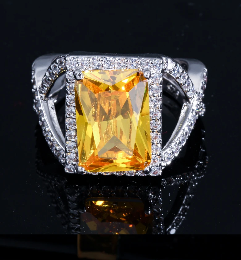 Golden topaz with simulated diamond cocktail ring