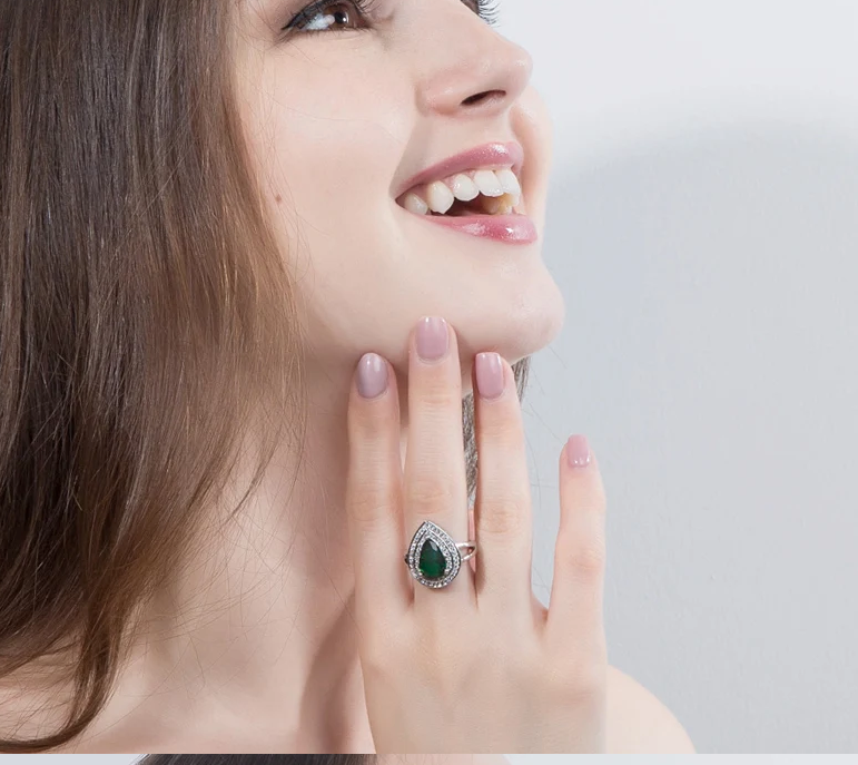 Luxurious CZ and Emerald Green cocktail ring